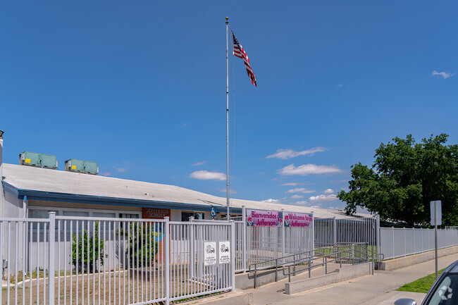 The flag proudly flies high at Jefferson Elementary School.