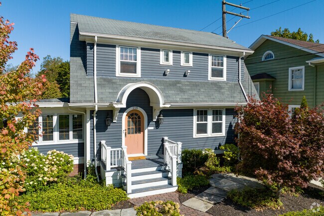 Many homes in the Williams Woodland Park neighborhood have arched roof porches.