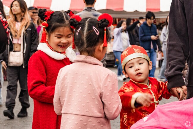 Children from Star View explore the colorful displays at the Asian Garden Flower Festival.