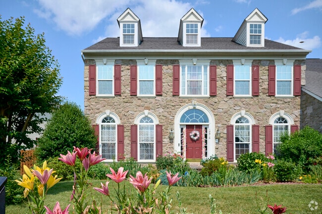 Colonial-style homes are common in Sudley Springs neighborhoods.