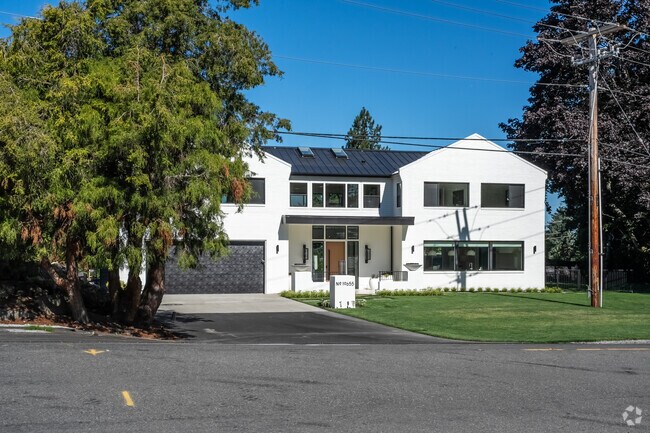 Contemporary homes in Normandy Park, have expansive green areas to play and enjoy time outside.