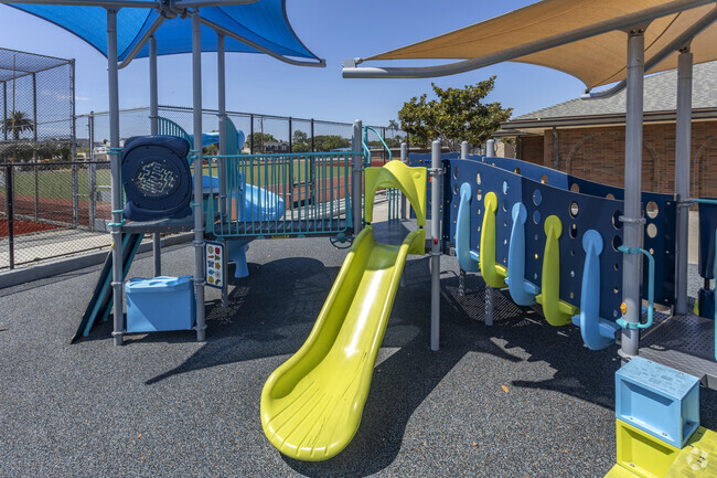 Coronado Village Elementary School students have fun on the playground.