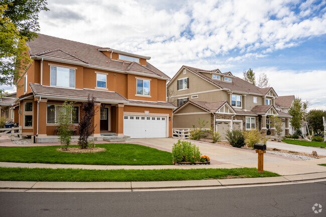Colorful contemporary homes with two and three car garages in Broadlands, Broomfield, Colorado.