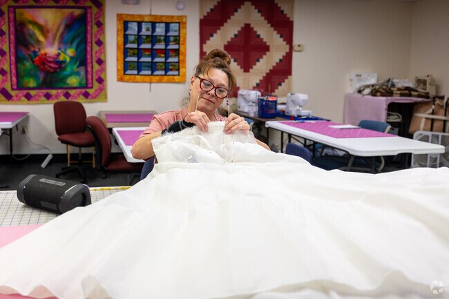 This local Big Chimney resident is altering a wedding dress.