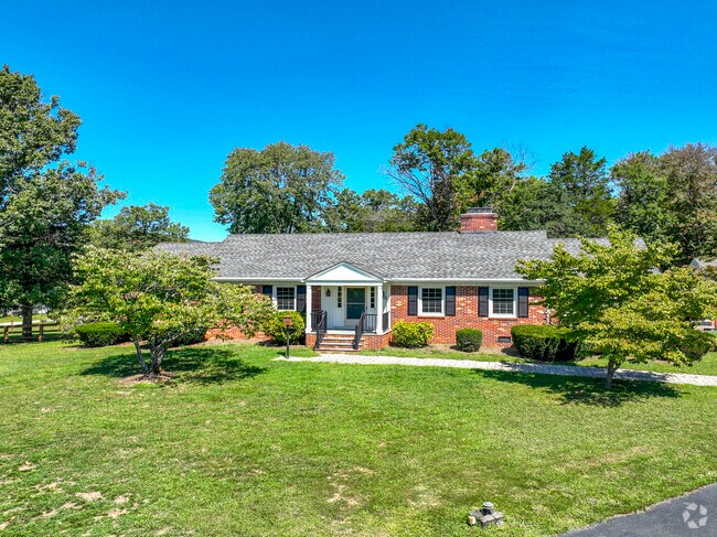 A brick raised ranch home on Springdale Dr in Keswick.