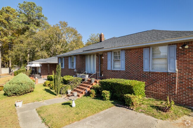 Many people in Burton Heights own brick ranch-style houses.