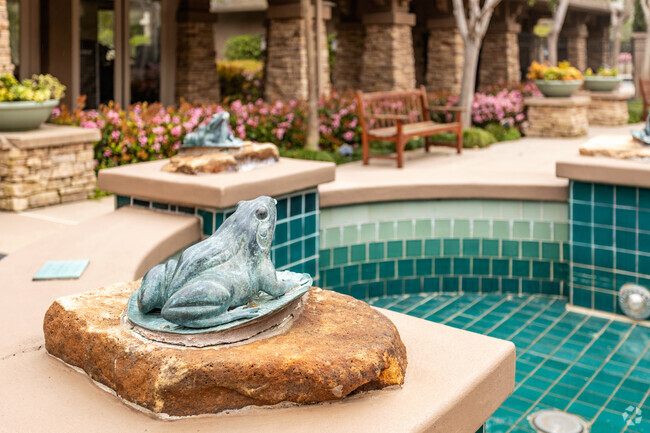 A life lice ceramic frog sits at the fountain at Stonecrest Village clubhouse in Serra Mesa.