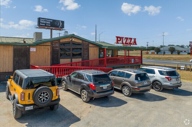 Enjoy a slice of pizza at Constantino’s, a local favorite in Somerset known for its cozy atmosphere and tasty menu.