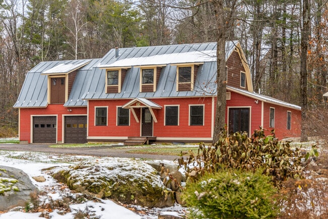 Colorful barn-style homes in Williston blend rustic charm with modern Vermont living.