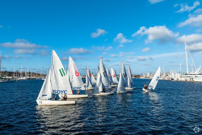 Sail boats from the San Diego Yacht Club take sail on a windy afternoon in La Playa.