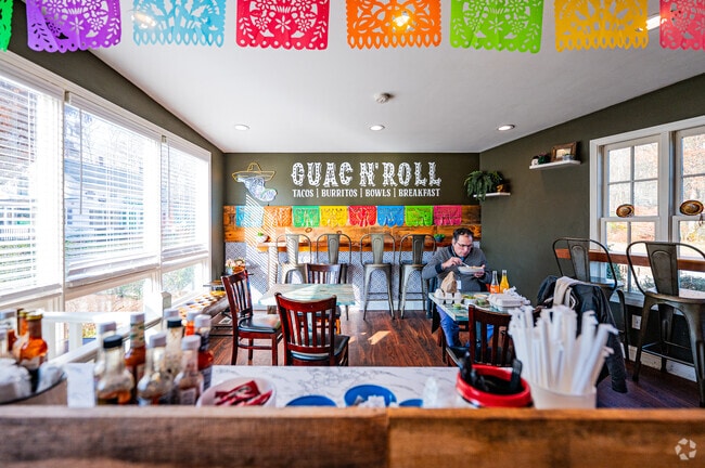Mexican-themed accents fill Aliana's Guac 'n Roll, a compact taco spot in Richmond, Rhode Island.