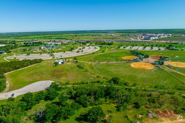 Southeast Metropolitan Park is a large sports complex with two baseball complexes, a soccer complex, two ponds, and a large shaded playground.