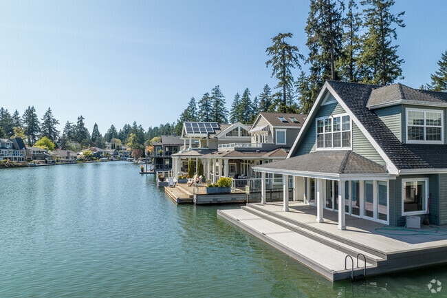 Floating homes line the shore of Lakewood Bay in Evergreen.