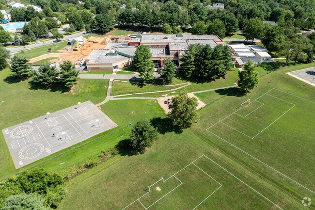 Aerial of Ronald A. McNair Elementary highlights its sports fields and playgrounds.