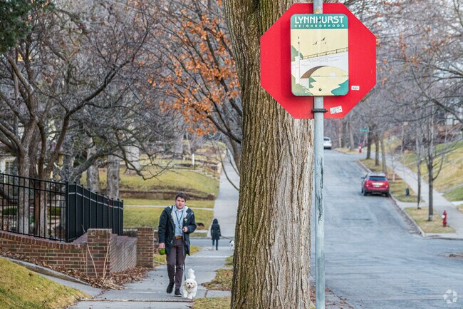 A Lynnhurst resident walks their dog in the neighborhood.