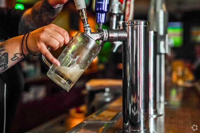 Residents swing by Four Corners Pub just north of Indian Spring for a pint with friends.