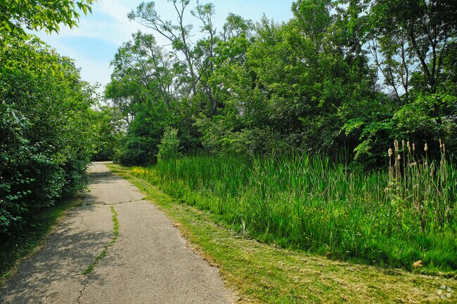 Pathways leading to Garden Homes park run between houses, connecting many homes to the park.