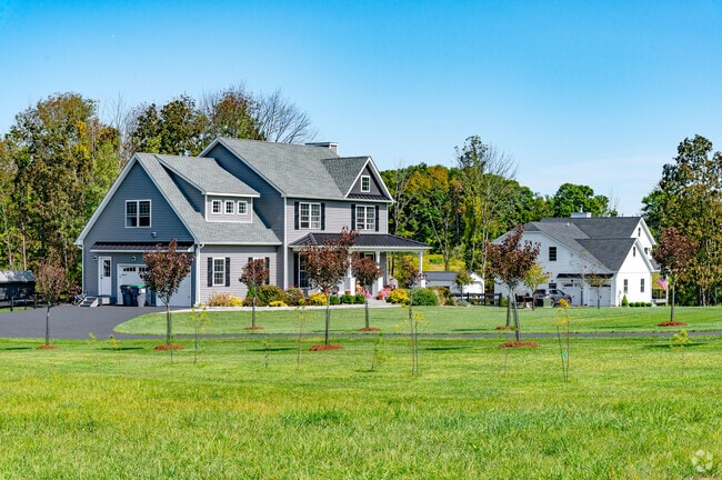 Residents value the quiet charm and greenery of Greenville Town’s neighborhoods.