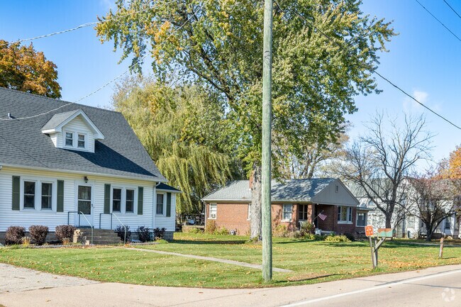 Row of brick and farmhouse style homes in Virgil.