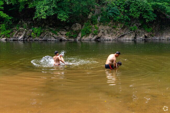 Many residents use the river access at Riverside Park to keep cool in the summer.