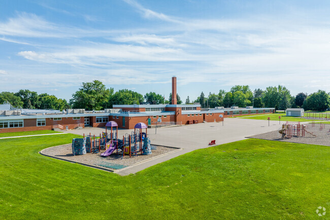 Neill Elementary in Crystal is committed to educational excellence with 30 full-time teachers.