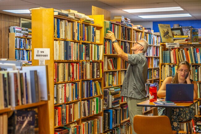 Pick out a new book at Webster Bookstore Cafe Downtown, near Highlands.