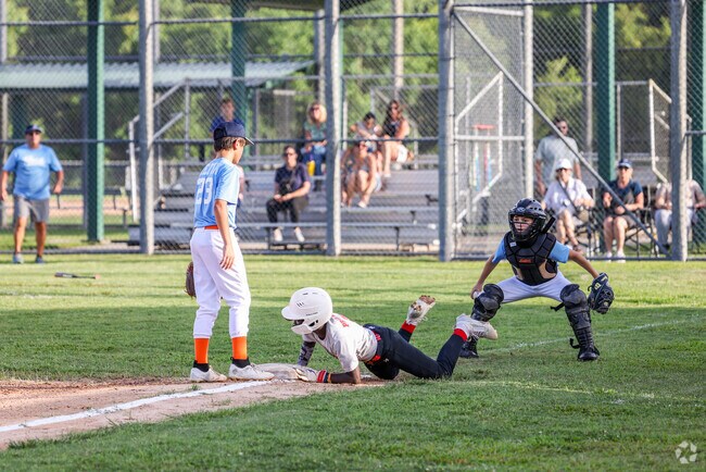 Youth baseball teams come to play at Parc Des Familles in Estelle.