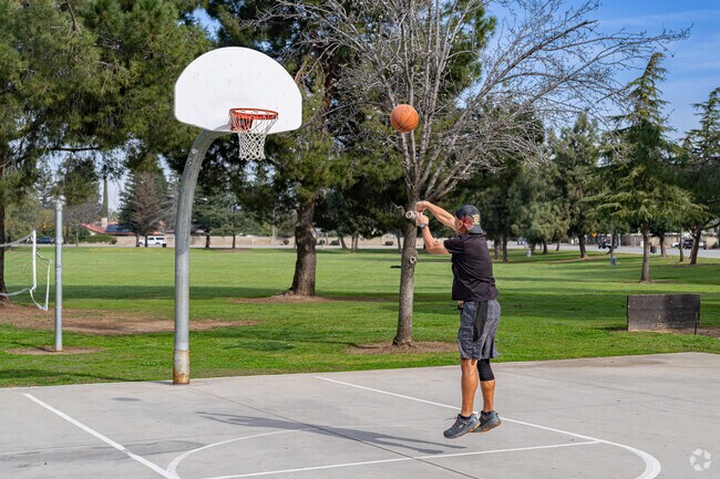 A Fruitvale resident enjoys shooting a few hoops before heading off to work.