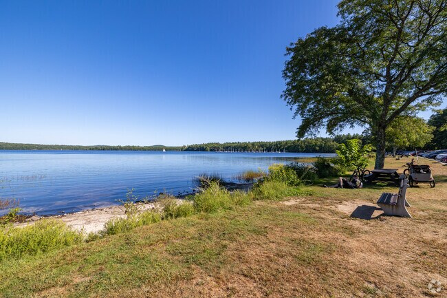 Lake Massabesic offers a serene escape with scenic views, perfect for boating & peaceful hikes.
