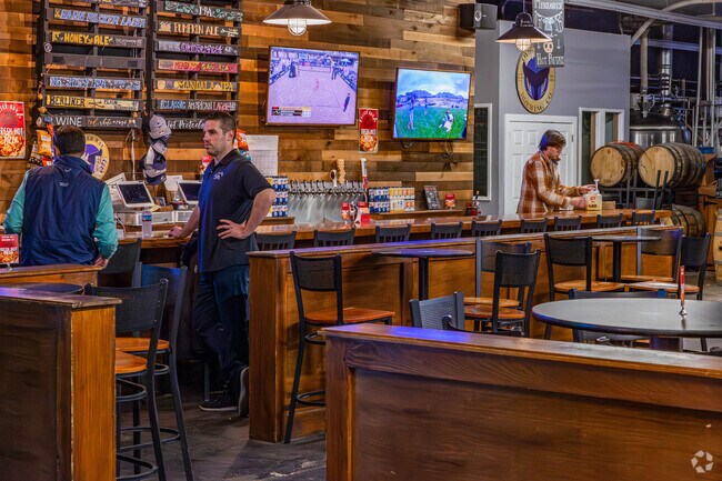 Enjoy local flavors at Oyster Bay Brewing Co., a favorite spot for small-batch beers.