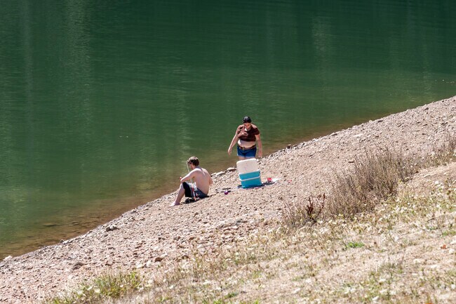 A lot of people enjoy the water at the Ben Irving Reservoir.