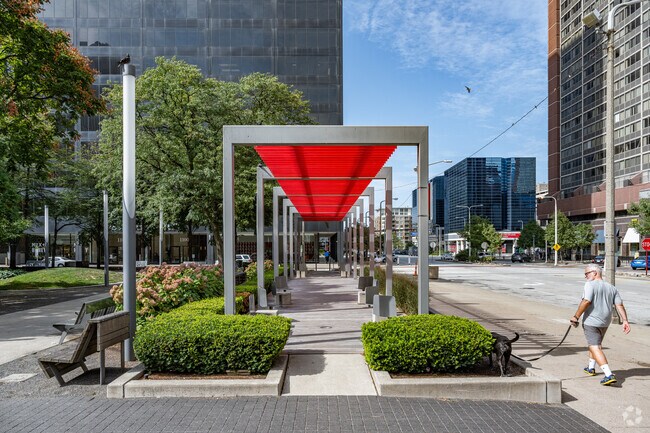 Playhouse Square residents often walk their dogs at Perk Plaza.