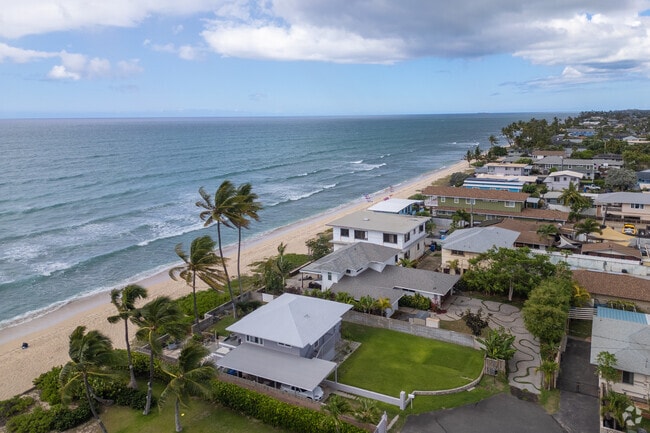 Beachfront properties in Ewa Beach, Hawaii, offer residents direct access to pristine sandy shores.