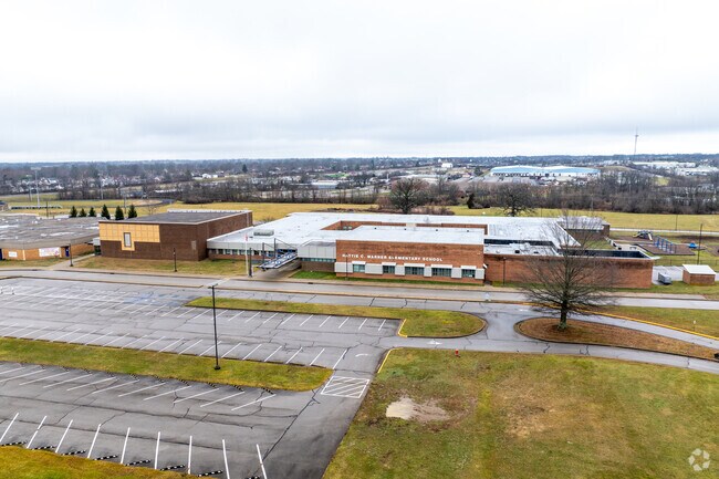 The student population of Hattie C. Warner Elementary School is 497 and the school serves 1-5.
