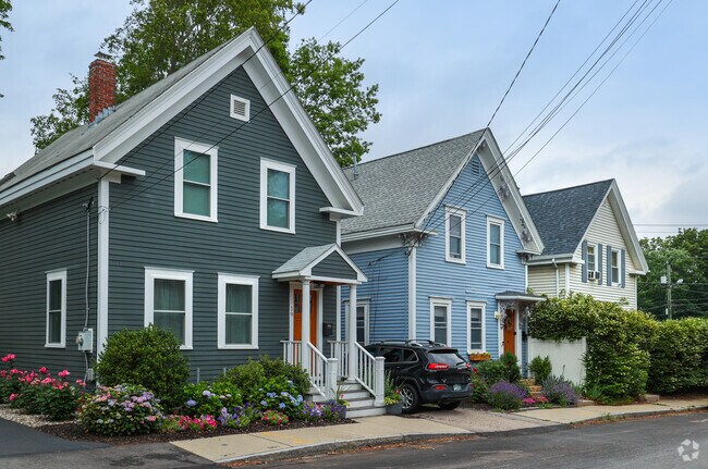 West Rows of classic New England style gabled homes line the streets of the West End, adding timeless charm and architectural character to the neighborhood.