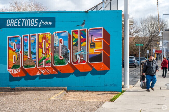 The Greeting from Burque murals welcome visitors to Nob Hill in Albuquerque.