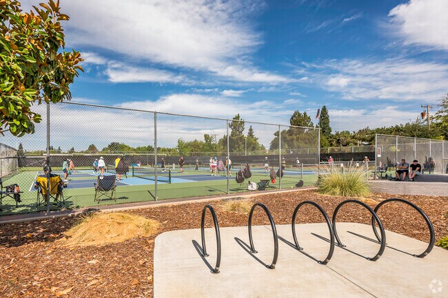 Try your game at pickleball on the many courts at Eastern Oak Park in Arcade Village.