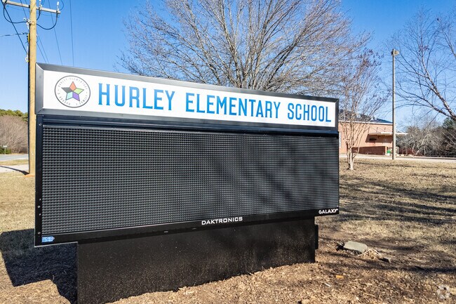 The plaque at the entrance to Hurley Elementary School.