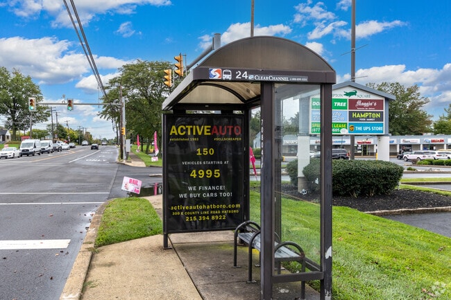 Transit riders wait for a SEPTA bus on 2nd Street Pike in Southampton.