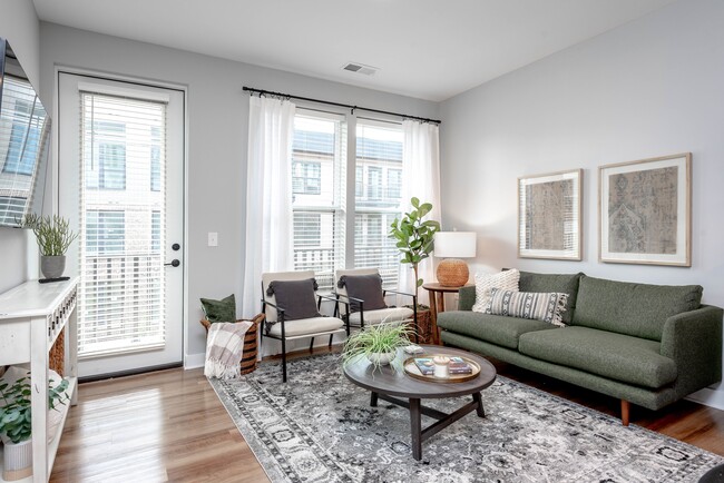 Founders 1 Bedroom Model Living Room and Balcony