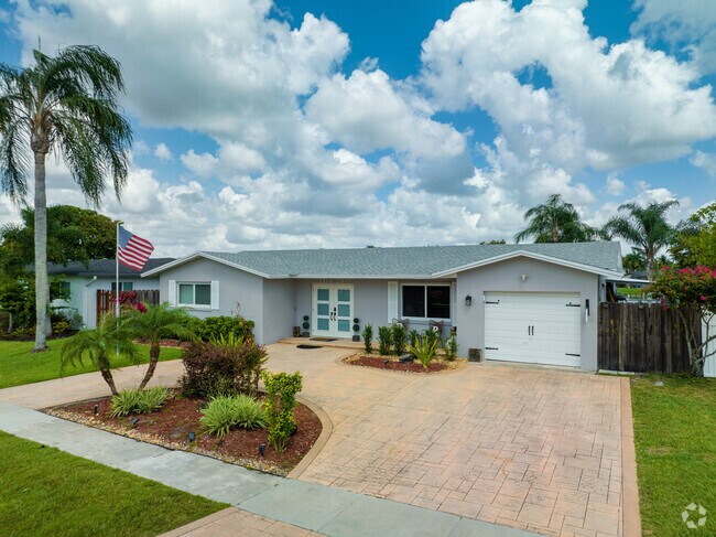 Pembroke Lakes Ranch Style homes have spacious driveways for comfort when parking.