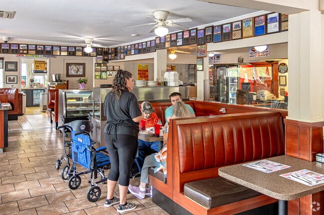 A time capsule of community and comfort lined with plaques, booths, and stories, The Jumboland Diner serves more than meals; it serves tradition.