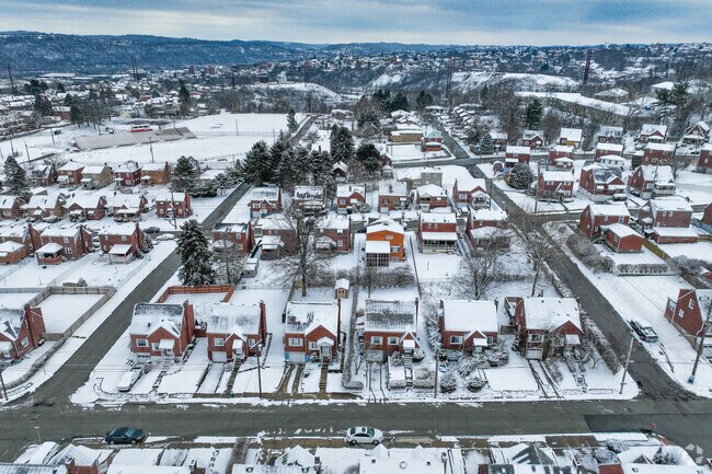 Get a nice view of the homes covered in snow covering Duquesne.