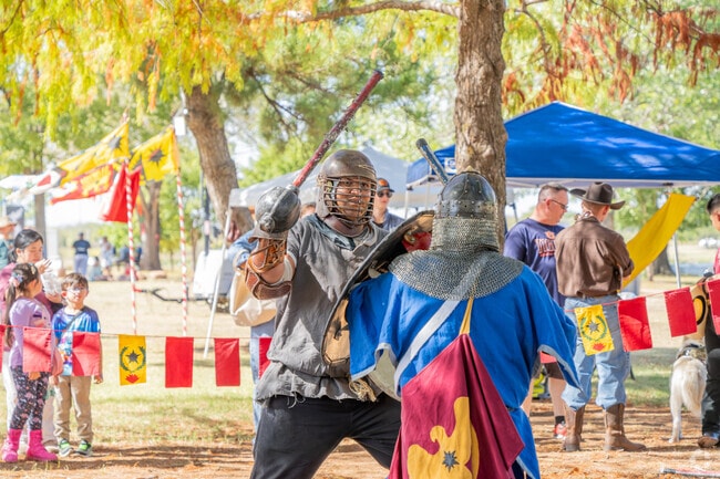 Elgin locals enjoy the International Festival with medieval-themed performances.