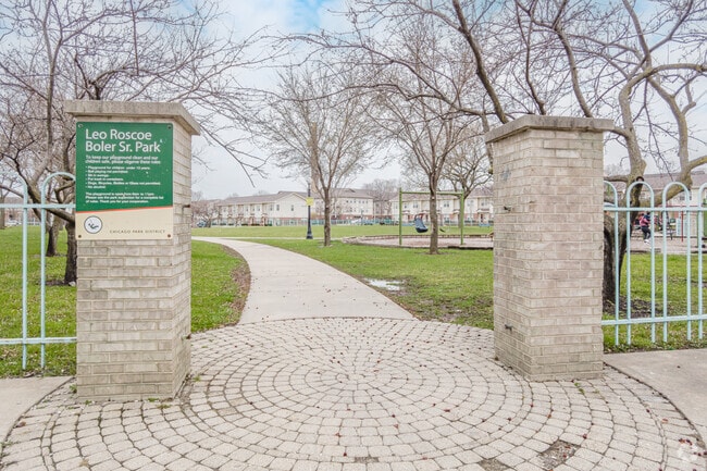 The stone entrance and signage at Boler Park is a common sight for Homan Square families.