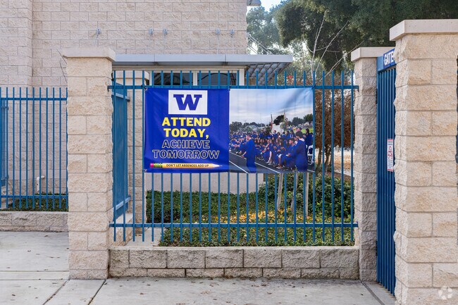 A banner at the entrance to Wilson Middle School in Exeter reminds students about attendance,