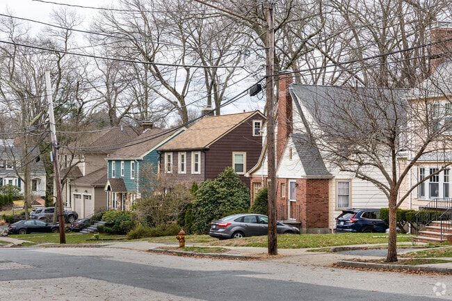 The streets of Newton Highlands are lined with a variety of home styles.