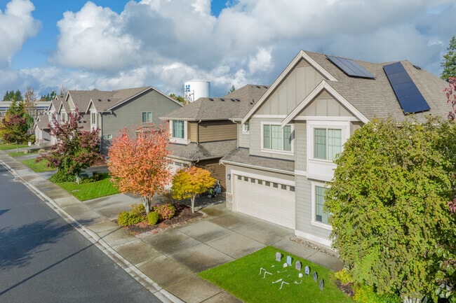 Streets lined with nicely manicured front yards are common in the Sunset neighborhood.