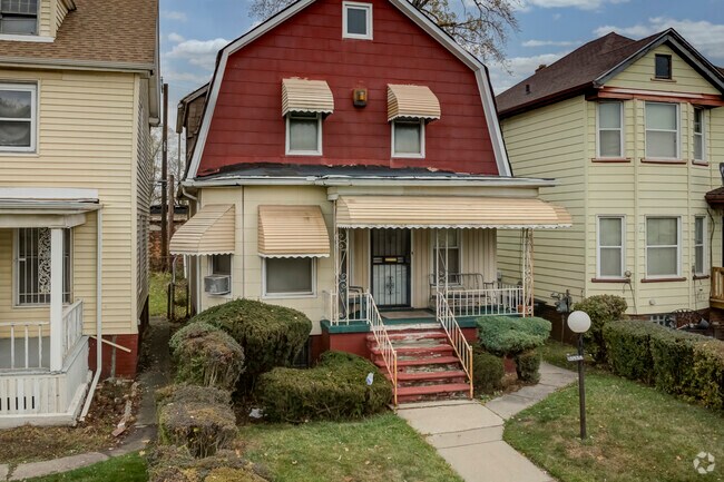 Colonial style homes stand out in the Elijah McCoy neighborhood.