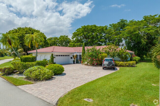 Mediterranean-style homes dot the streets of The Woodlands.